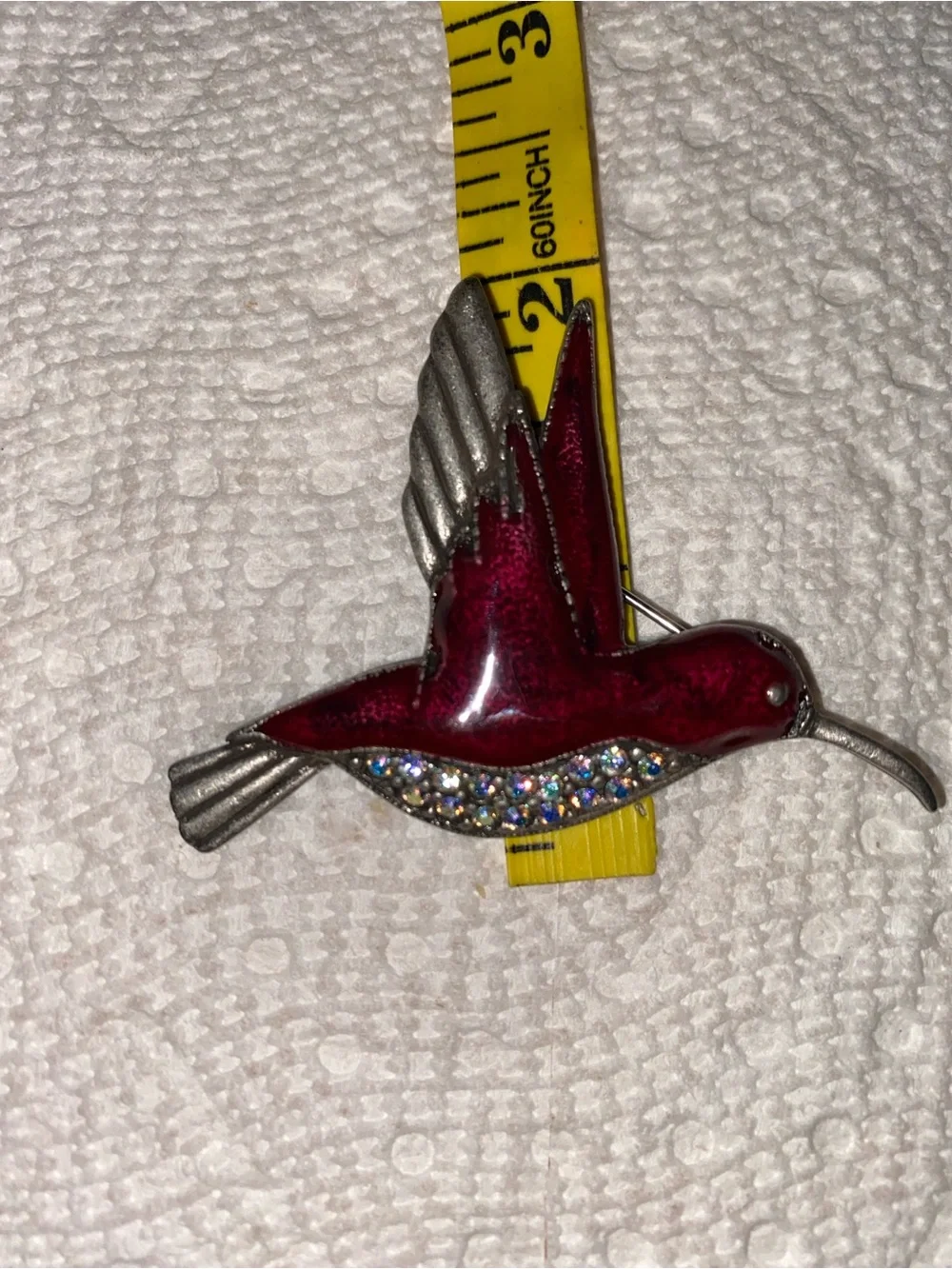 Vintage burgundy enamel, hummingbird. AB Rhinestone Silvertone pin.